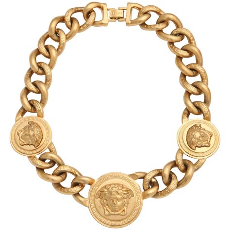 how much is versace one karat gold chain|Versace necklace.